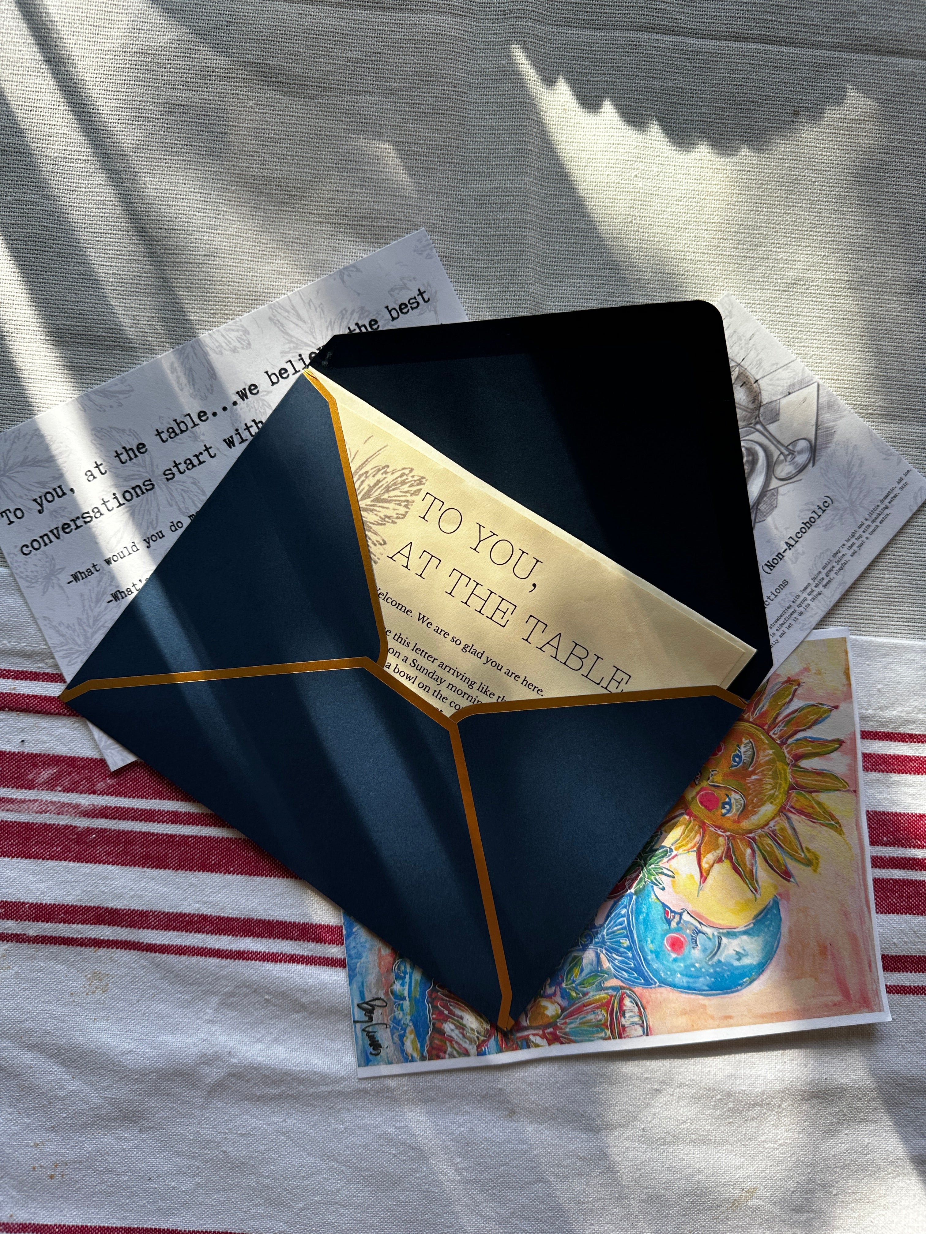 Greeting card with geometric design and text on a textured surface